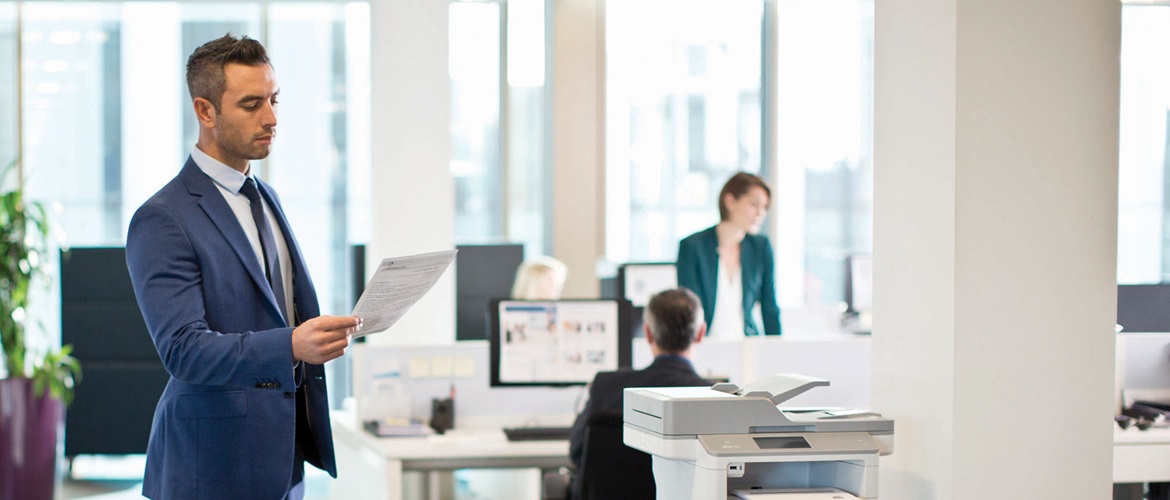 Three colleagues working in an office 